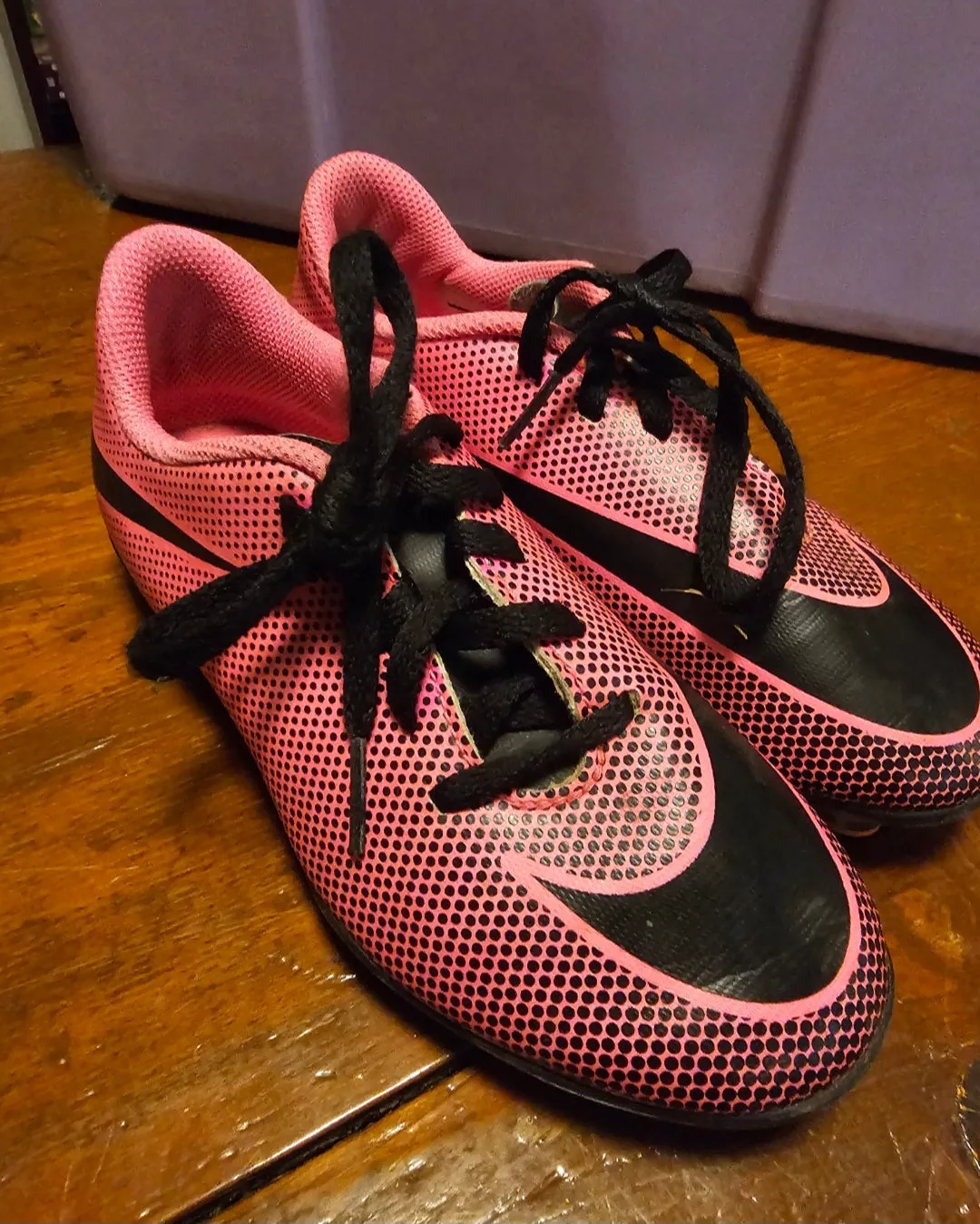Pink & black Nike cleats - size Shoes:  1 & 1.5 (Little Kid)