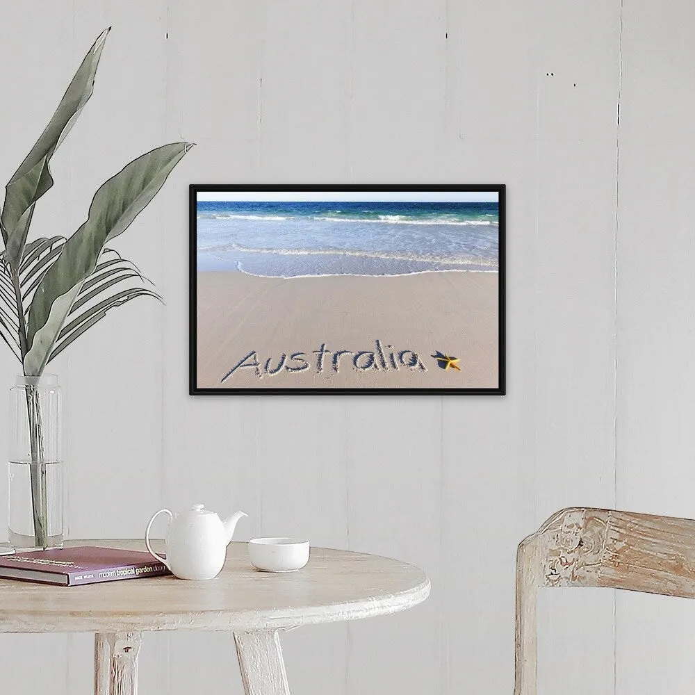 "Australia written on a sandy beach with a yellow starfish" Black Float Frame Canvas Art