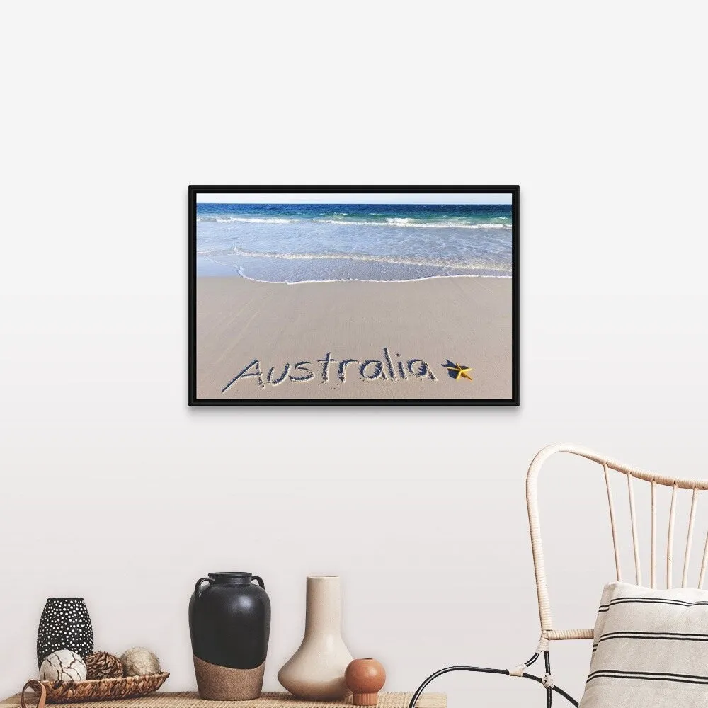"Australia written on a sandy beach with a yellow starfish" Black Float Frame Canvas Art